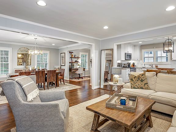 Open floorplan den + dining room + breakfast nook + kitchen