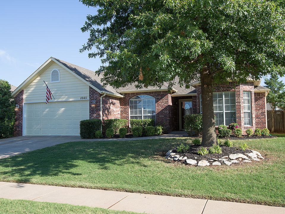 Charming North Bixby bungalow with fabulous updates throughout.