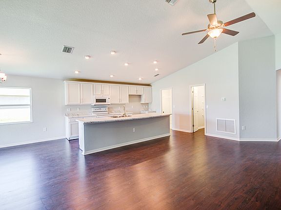Spacious living room - New home for sale in Zephyrhills, FL