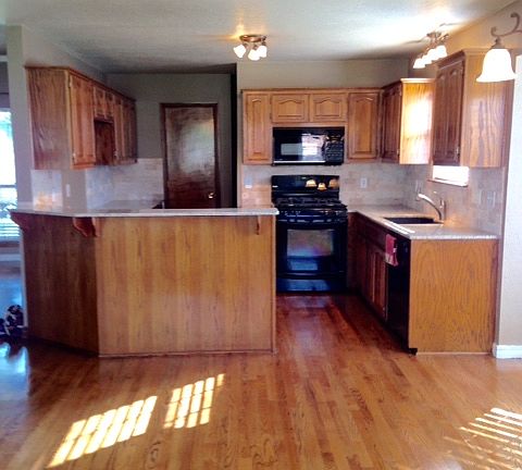 KITCHEN OPEN TO BOTH LIVING 