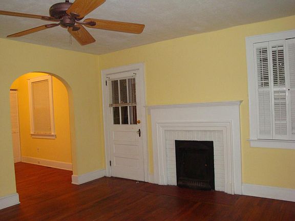 Living room is actually pale cream/yellow