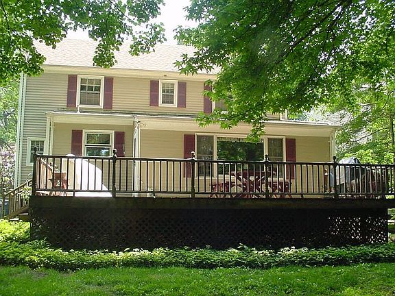 Back view of home with huge deck