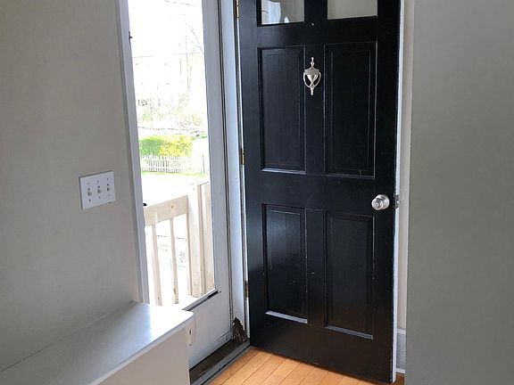 Front Entry. Second Bedroom door opposite front door, across entry floor.