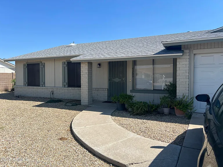 7203 W Hatcher Rd — Photo 1