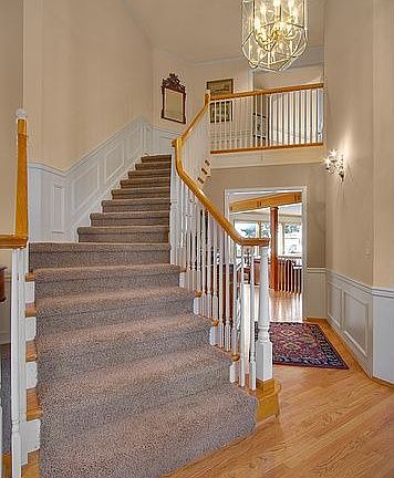 Bright open high ceilings to this lovely foyer