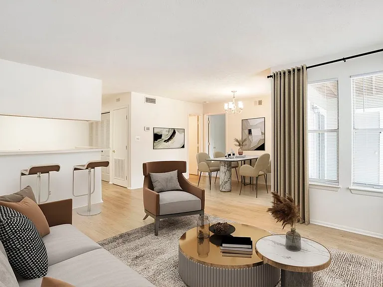 Renovated Meadows I living and dining room with hard surface flooring