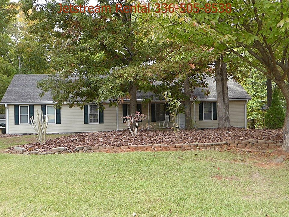 Front with mature shade trees