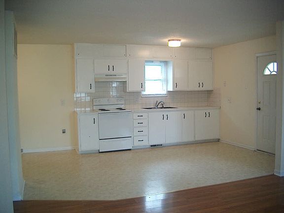 Kitchen w/ Stove & Refrigerator