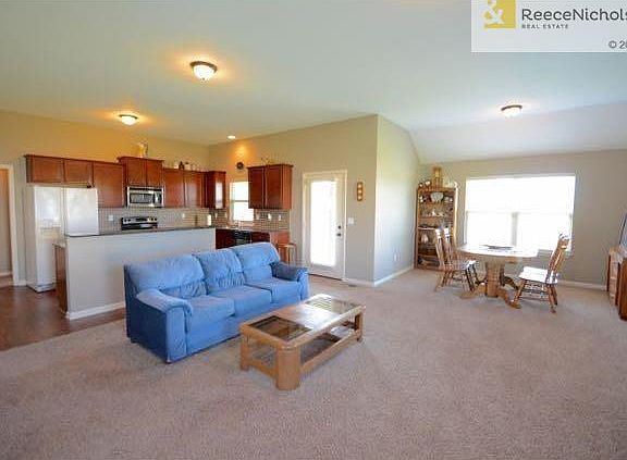 Large open area - wonderful for entertaining! Easy to maintain, but spacious!