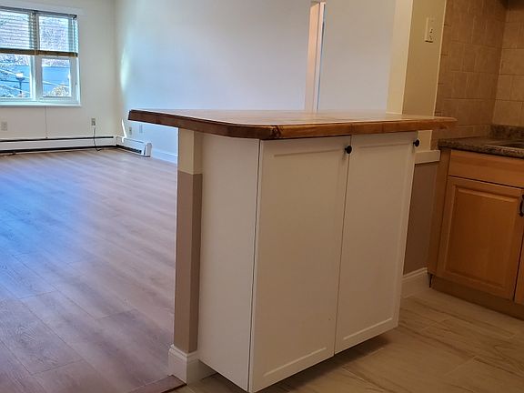 breakfast bar/peninsula added for open Concept living area