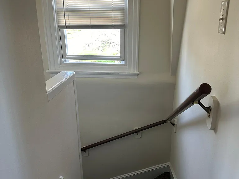 Steps leading from apartment down to apartment door
