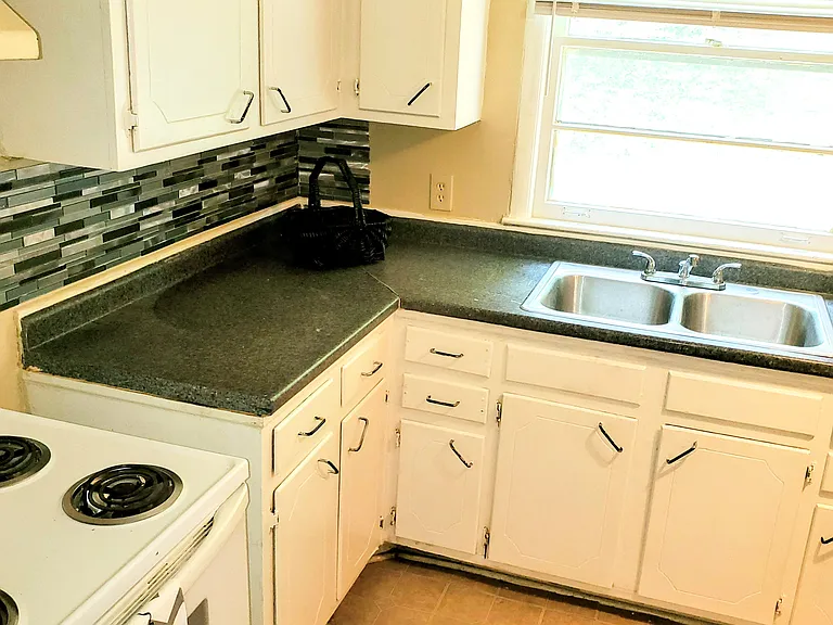 cute country kitchen with cabinets galore