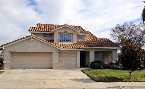 modern two level, attached 3 car garage