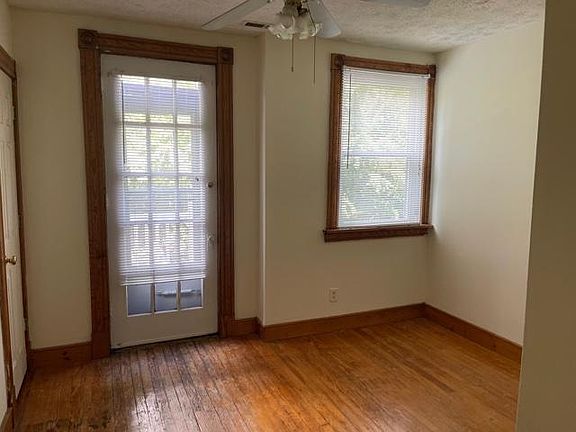 front bedroom, which features an adjoining porch