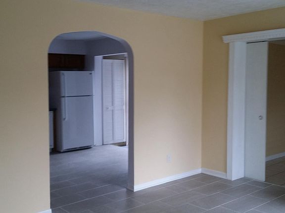 Living room to kitchen and 3rd bedroom
*Wall colors may have changed