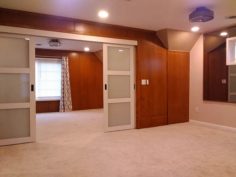 Another view from living room into bedroom. Both fans are built into the LED light fixture and use remotes.