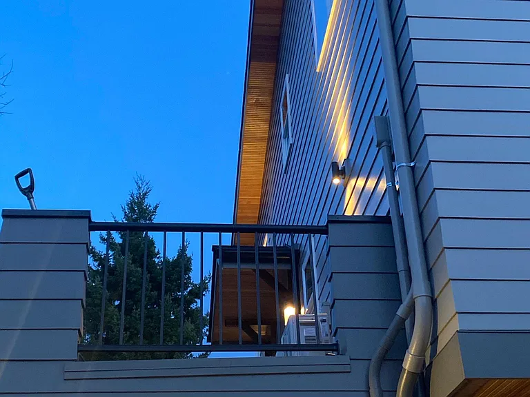Well lit, modern rooftop entertainment area!