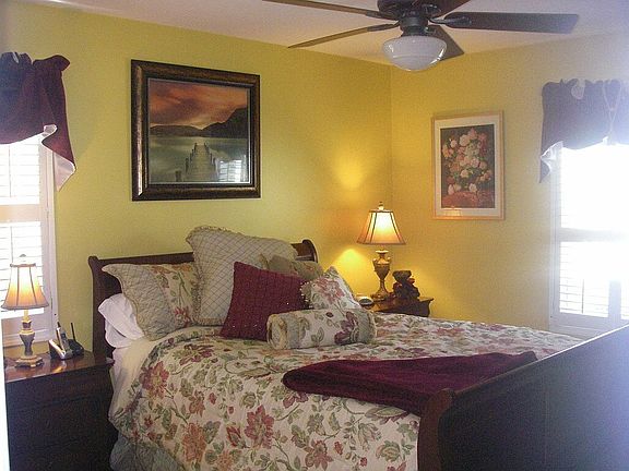 1st floor Master with plantation shutters, Hunter ceiling fan