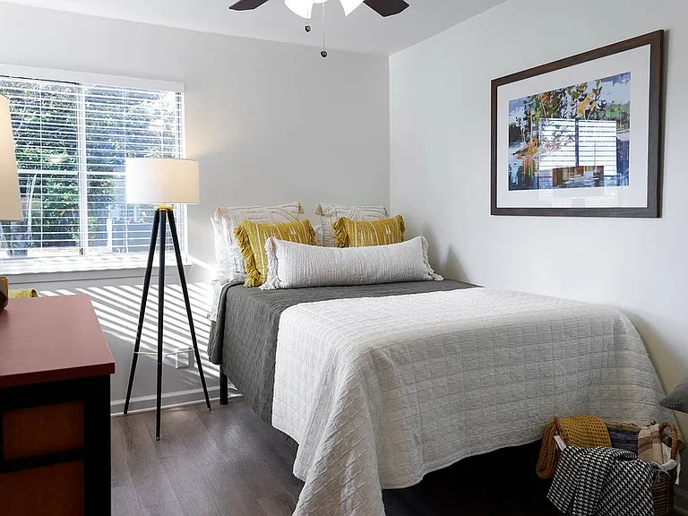Sleep in comfort with spacious bedrooms and natural light at The Preserve at Tuscaloosa.