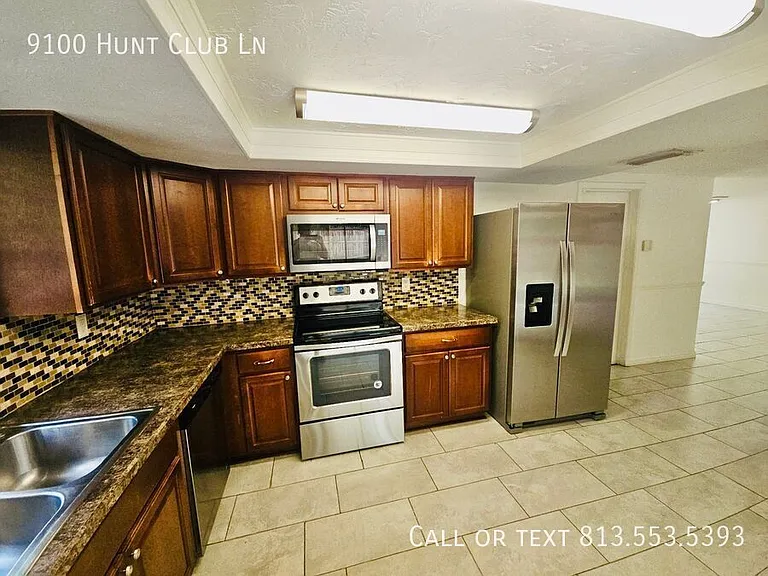 9100 Hunt Club Ln — Photo 19