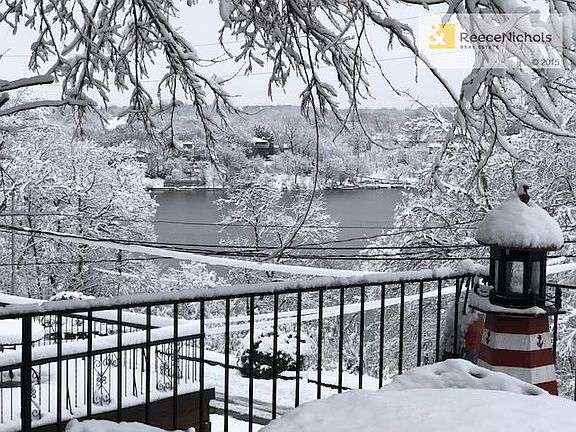 Every season is just spectacular from the back deck of this home... with the view of the lake.
