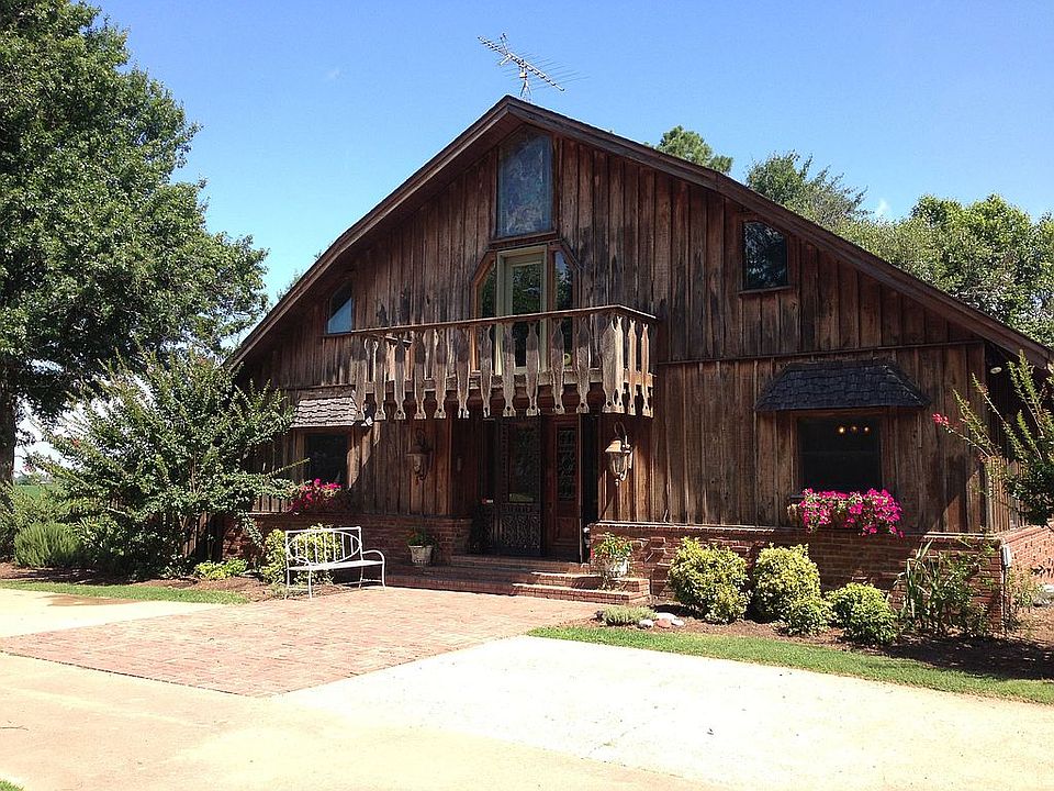 Cypress/brick exterior
