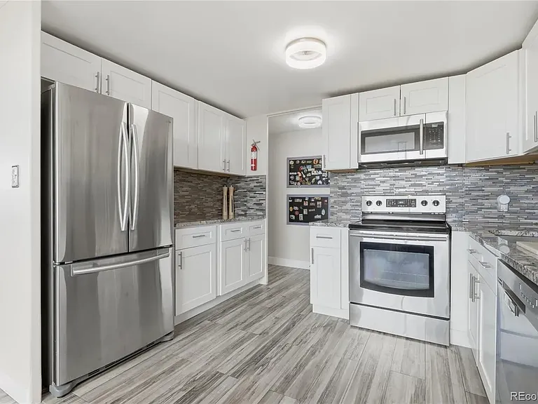 Kitchen with stainless steel appliances
