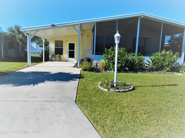 1013 Ginger Ln, Barefoot Bay, FL 32976