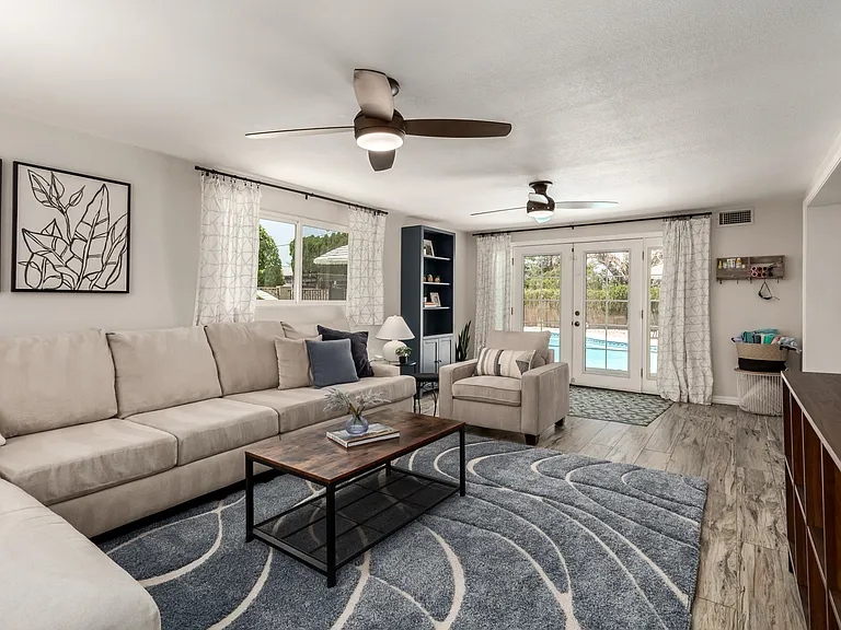 2nd Living Room with comfy sectional, Smart TV, books, games and plenty of natural light!