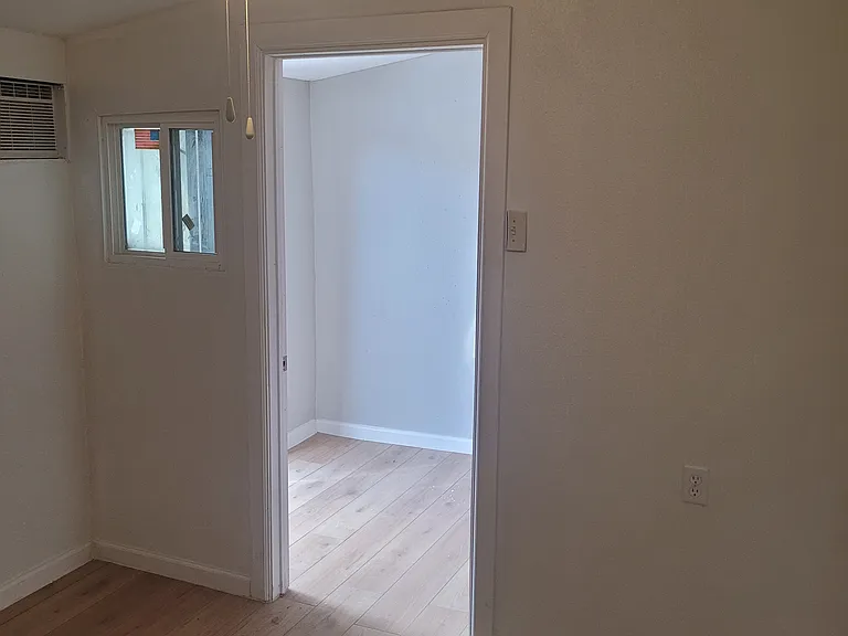 Ground floor bedroom next to back entrance