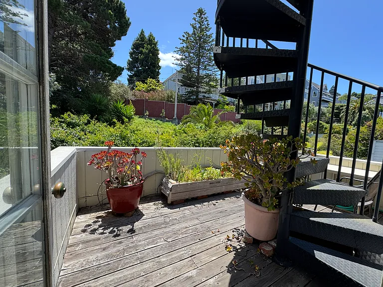 south facing back deck accessible from master bedroom