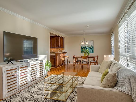 Living room and dining room have tons of natural light. In fact the entire house has great natural light throughout