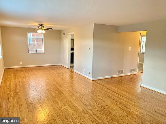 living room looking towards kitchen and hallway