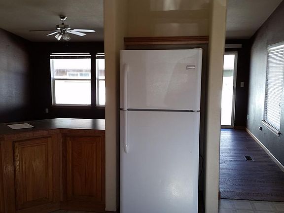 Kitchen opens to Living Area