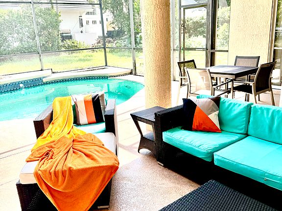 Outdoor summer kitchen, TV, pool area