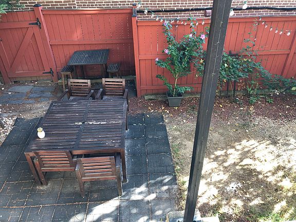 Comes with patio furniture and a gas grill