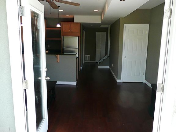 Open floor plan living space with large storage areas