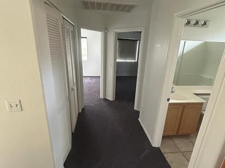 Laundry room on left (not pictured) with electric washer and dryer included if needed.