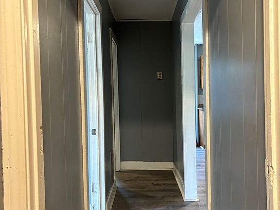 Hallway leading to kitchen and bedrooms.