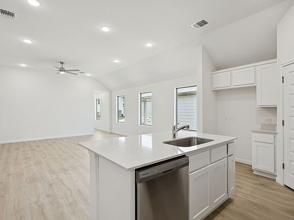 Kitchen in the Cypress home plan by Trophy Signature Homes - REPRESENTATIVE PHOTO