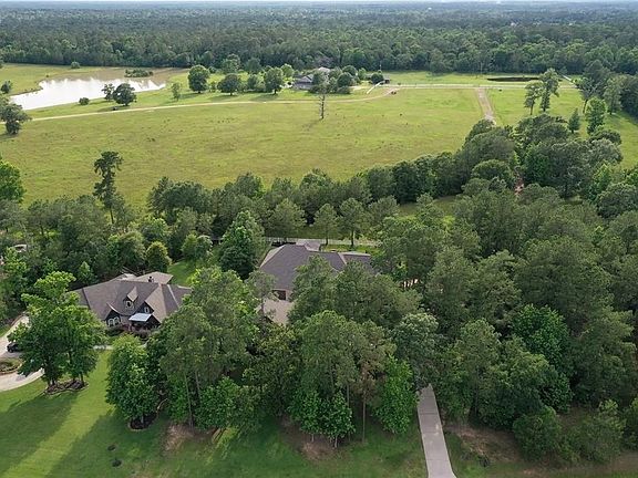 Backs to large acreage homesite! Quiet street in the Villages of High Meadow Ranch!