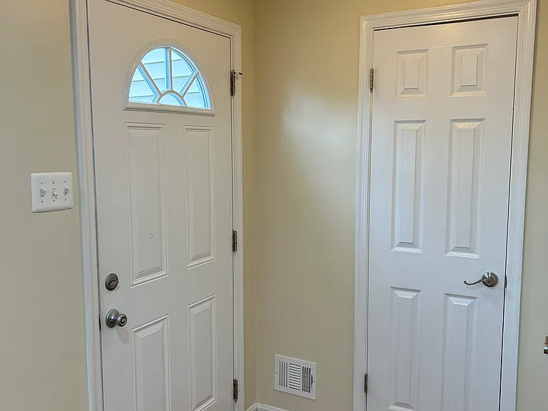 Front door, powder room