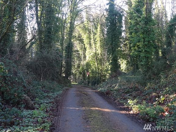 Road leading to the home which is located on the right side once you get to the end of the road. 