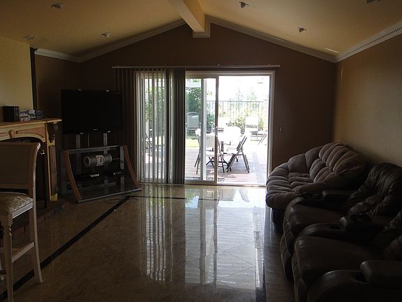 Large Den with Fireplace.