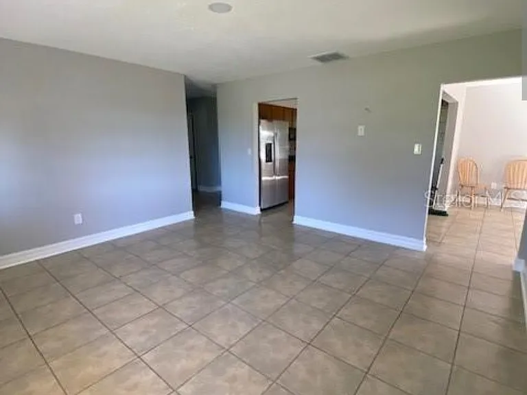 4316 E Knights Griffin Rd — Photo 4