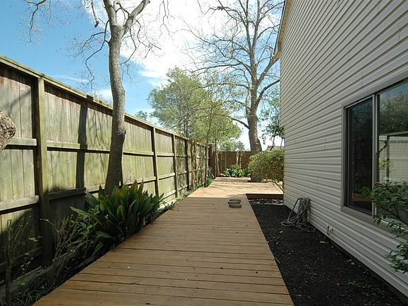 VIEW OF SIDE YARD WITH DECKING