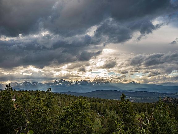 Sunset over the mountains, view from deck