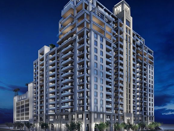 Nighttime South view of Regency Parc's architectural exterior, highlighting its elegant design.