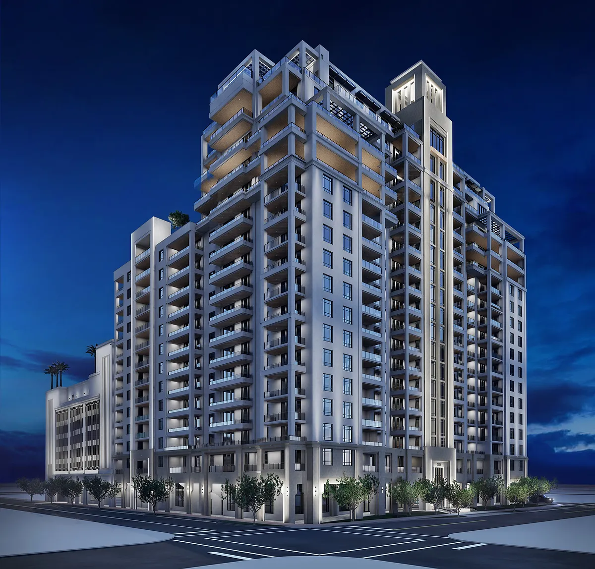 Nighttime South view of Regency Parc's architectural exterior, highlighting its elegant design. - Regency Parc