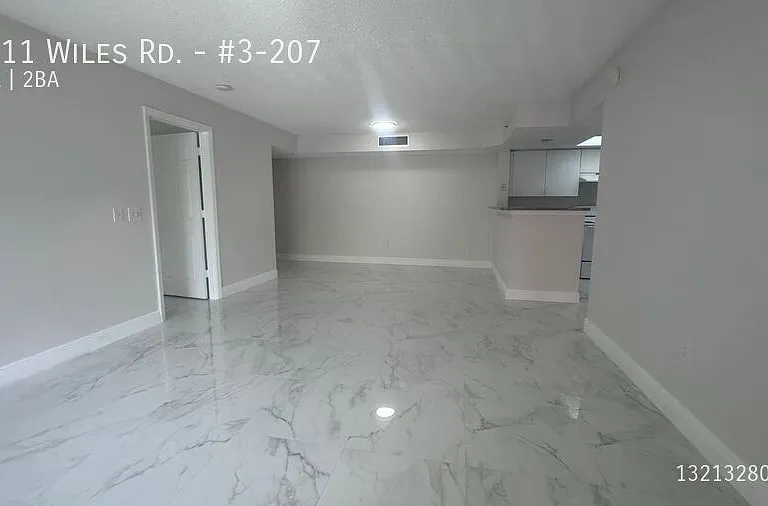 5011 Wiles Rd #3-207 — Photo 31